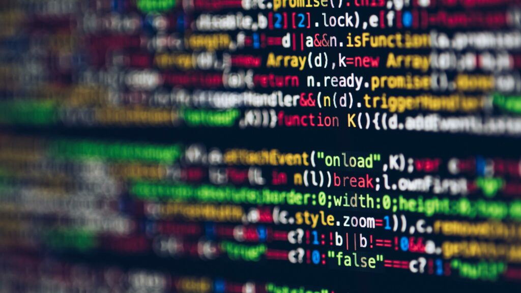 Image shows a piece of code on balck background